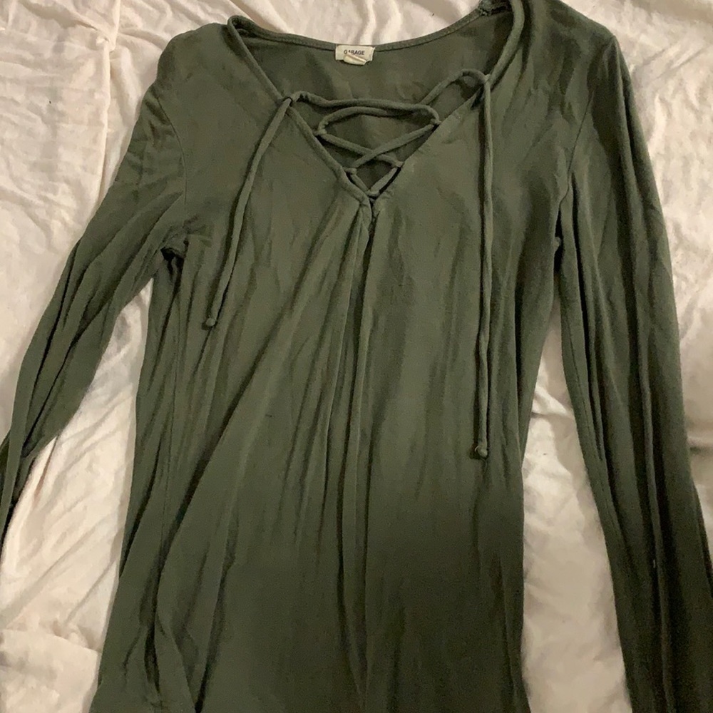Dark green long sleeve with cross string in front